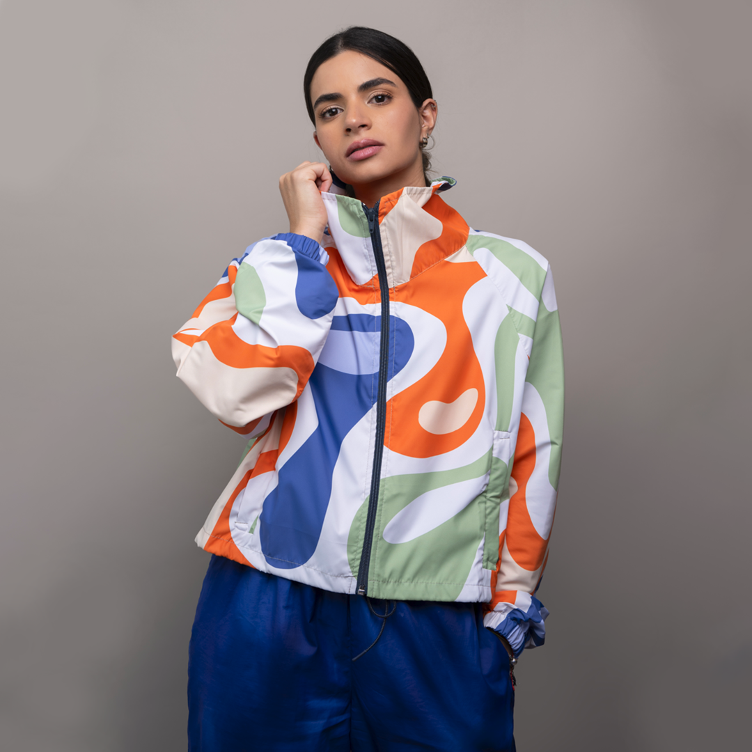 Rompevientos Cropped Movimiento en Color